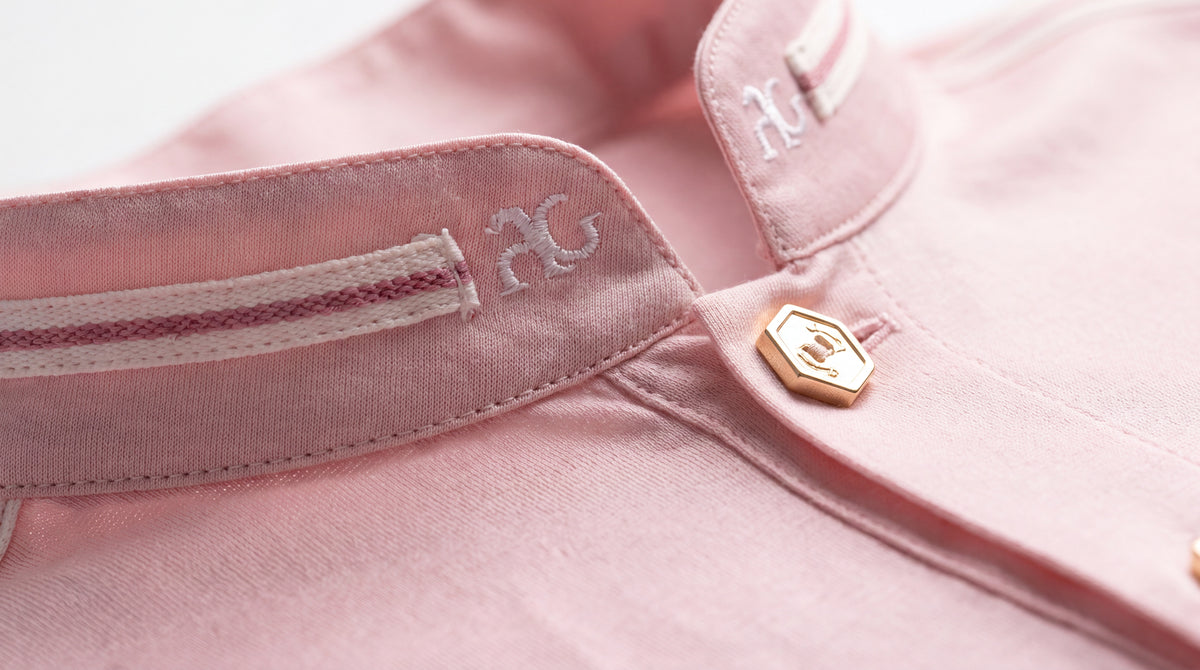 Pink Angelo Galasso polo collar with embroidered AG logo and gold button